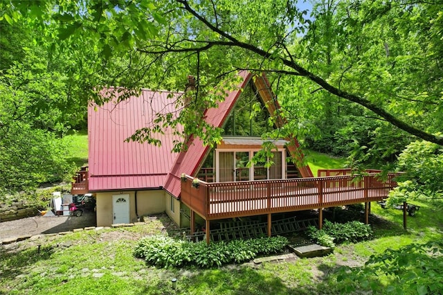 798 Cross Creek Rd, Avella, PA 15021 - back of property with a wooden deck and metal roof