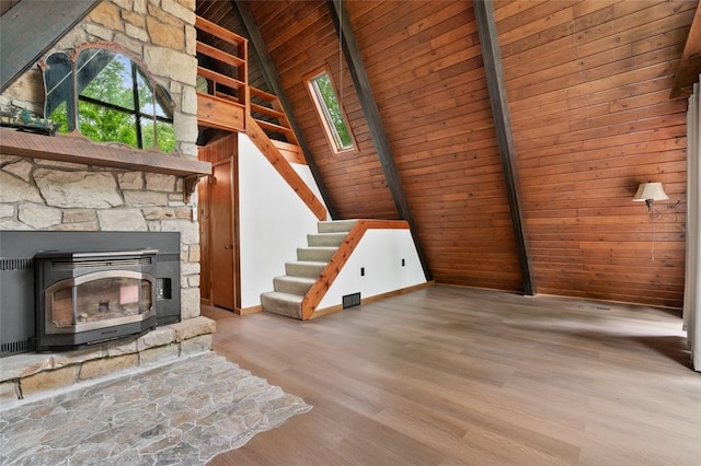 798 Cross Creek Rd, Avella, PA 15021 - unfurnished living room featuring wooden ceiling, wood finished floors, stairway, and wooden walls