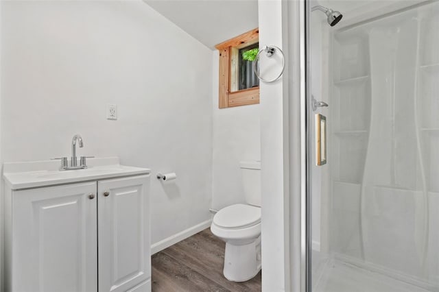 798 Cross Creek Rd, Avella, PA 15021 - bathroom with toilet, a shower stall, vanity, wood finished floors, and baseboards