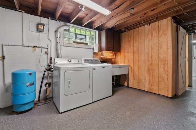 798 Cross Creek Rd, Avella, PA 15021 - laundry area with independent washer and dryer, concrete block wall, cabinet space, and wooden walls