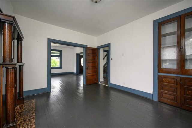920 Roup Ave, Brackenridge, PA 15014 - empty room with dark wood-style floors and baseboards