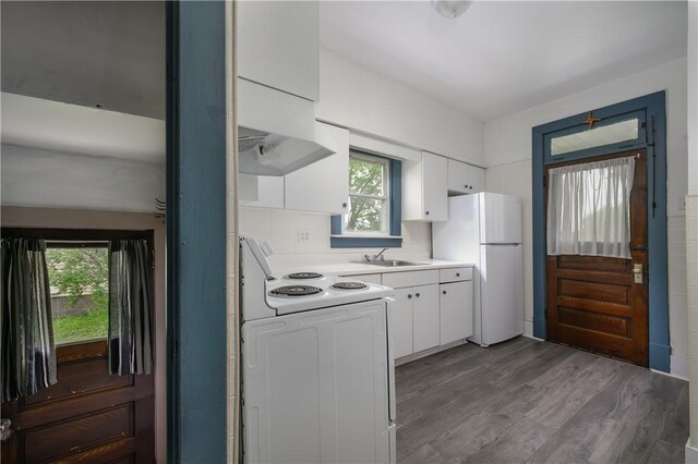 920 Roup Ave, Brackenridge, PA 15014 - kitchen with white appliances, white cabinetry, plenty of natural light, and light countertops
