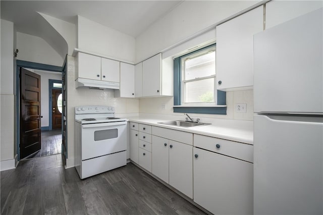 920 Roup Ave, Brackenridge, PA 15014 - kitchen with freestanding refrigerator, white range with electric cooktop, a sink, under cabinet range hood, and light countertops