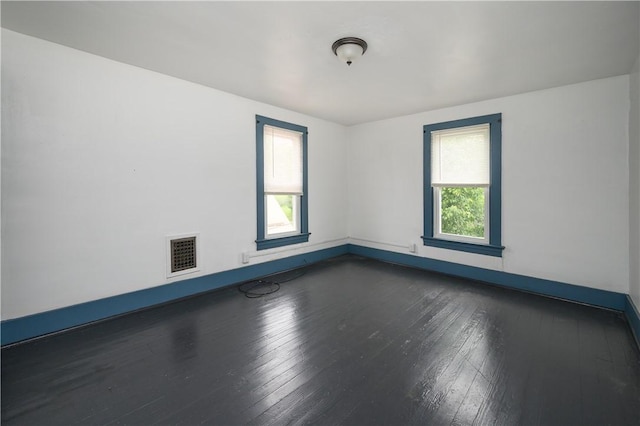 920 Roup Ave, Brackenridge, PA 15014 - unfurnished room with dark wood-type flooring and baseboards