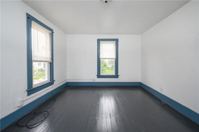 920 Roup Ave, Brackenridge, PA 15014 - bonus room featuring dark wood-style floors and baseboards