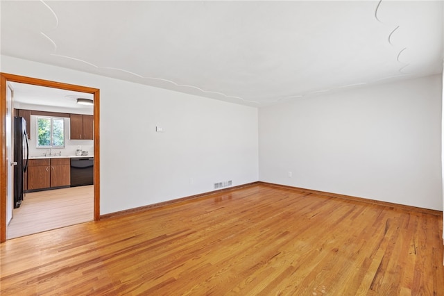 1317 Cathell Rd, Baldwin Boro, PA 15236 - spare room with light wood-type flooring and a sink