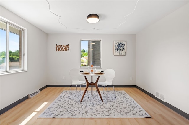 1317 Cathell Rd, Baldwin Boro, PA 15236 - dining room with light wood-style floors and baseboards
