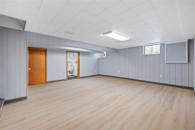 1317 Cathell Rd, Baldwin Boro, PA 15236 - below grade area with wood finished floors and washer / clothes dryer
