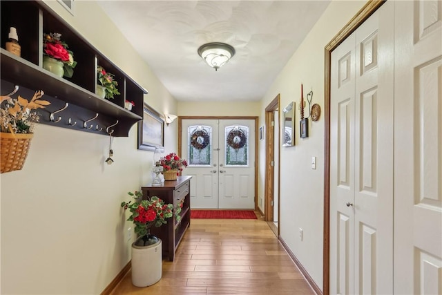 108 Covington Dr, Center Twp, PA 16001 - entryway with light wood-style floors, baseboards, and french doors