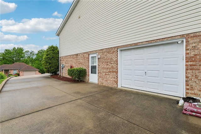 108 Covington Dr, Center Twp, PA 16001 - garage featuring concrete driveway