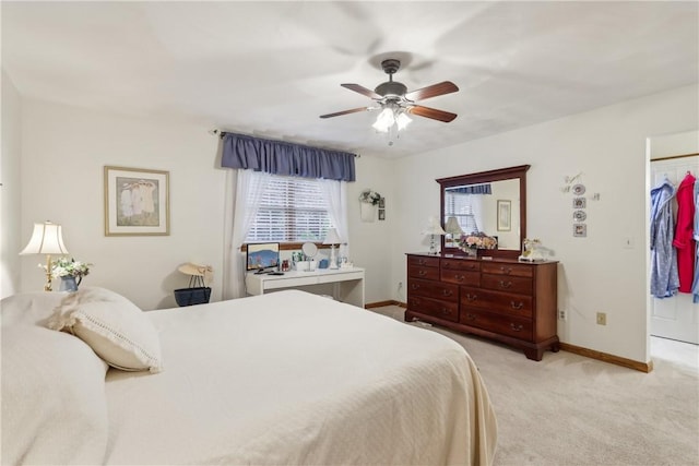 108 Covington Dr, Center Twp, PA 16001 - bedroom with light colored carpet, baseboards, a ceiling fan, and a spacious closet