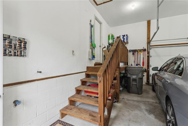 108 Covington Dr, Center Twp, PA 16001 - stairway with unfinished concrete flooring and attic access