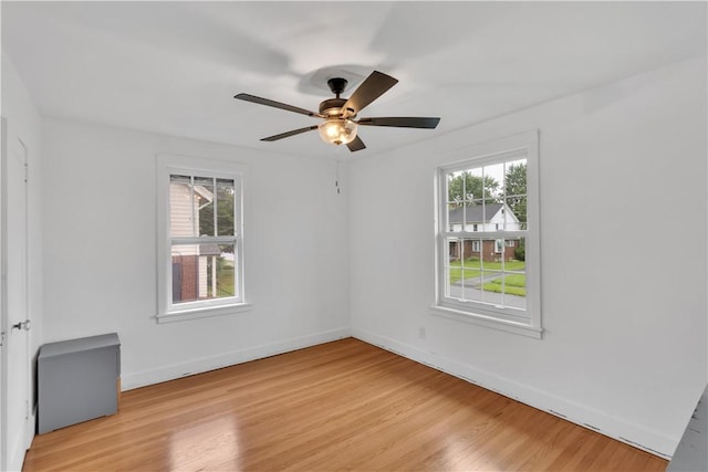 111 E Sheridan Ave, New Castle/2Nd, PA 16105 - spare room featuring light wood-style floors, ceiling fan, and baseboards