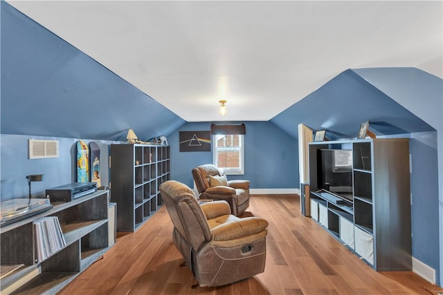 111 E Sheridan Ave, New Castle/2Nd, PA 16105 - sitting room featuring wood finished floors, baseboards, and lofted ceiling