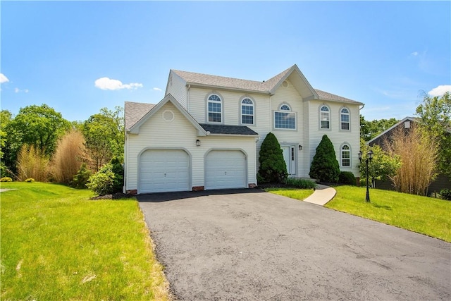 821 Kingston Dr, South Fayette, PA 15057 - view of front facade with driveway, a front lawn, and a shingled roof