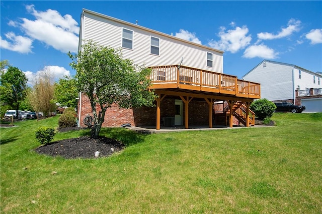821 Kingston Dr, South Fayette, PA 15057 - back of house featuring a deck, stairs, a yard, and brick siding