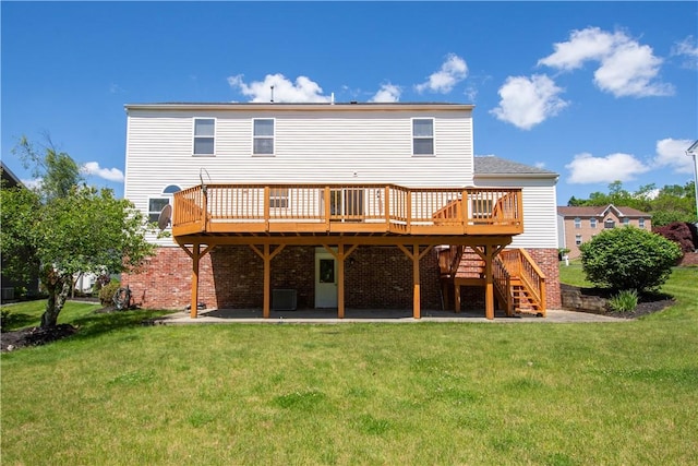 821 Kingston Dr, South Fayette, PA 15057 - back of house featuring a wooden deck, a lawn, and stairway