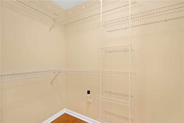 821 Kingston Dr, South Fayette, PA 15057 - walk in closet with wood finished floors