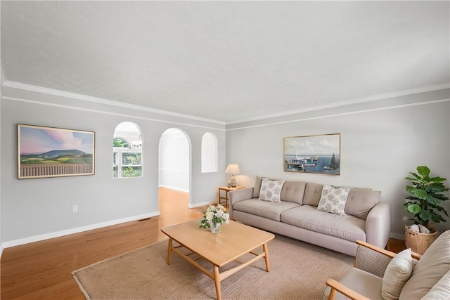 821 Kingston Dr, South Fayette, PA 15057 - living area featuring crown molding, wood finished floors, and baseboards