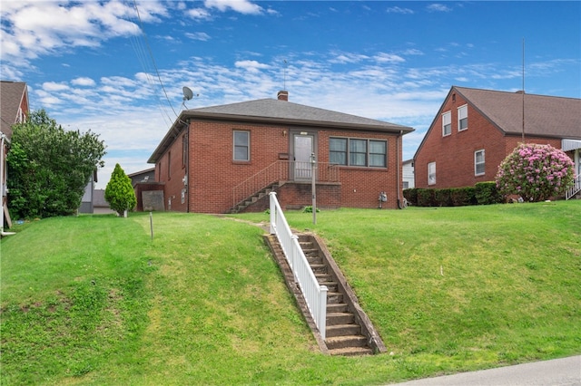 1007 High St, Luzerne Twp, PA 15417 - back of property with brick siding, a chimney, and a yard