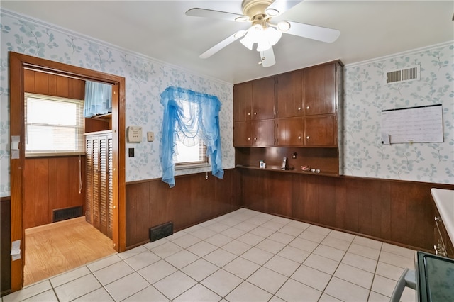 1007 High St, Luzerne Twp, PA 15417 - unfurnished dining area with a wainscoted wall, wallpapered walls, ceiling fan, and ornamental molding