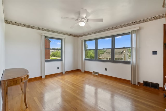 1007 High St, Luzerne Twp, PA 15417 - unfurnished room with a ceiling fan, light wood-style floors, and baseboards