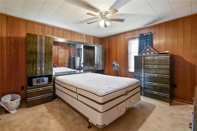1007 High St, Luzerne Twp, PA 15417 - bedroom featuring wood walls, light carpet, and ceiling fan