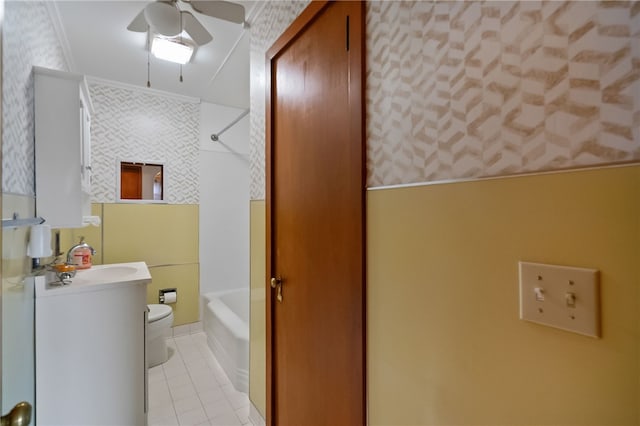 1007 High St, Luzerne Twp, PA 15417 - bathroom featuring a ceiling fan, vanity, toilet, bathing tub / shower combination, and ornamental molding