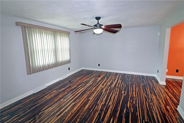 418 Newport Dr, Hempfield Twp Wml, PA 15601 - unfurnished room featuring a ceiling fan, baseboards, and wood finished floors