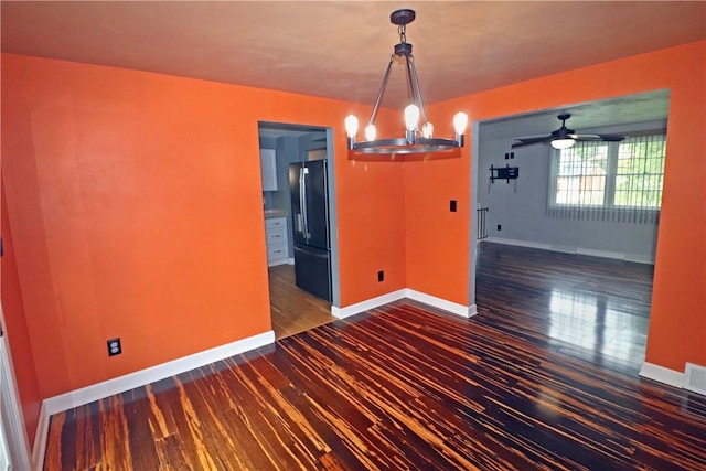 418 Newport Dr, Hempfield Twp Wml, PA 15601 - unfurnished dining area featuring wood-type flooring, a chandelier, and baseboards