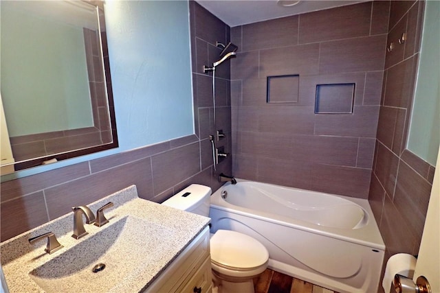 418 Newport Dr, Hempfield Twp Wml, PA 15601 - full bathroom with toilet,  shower combination, vanity, and tile walls