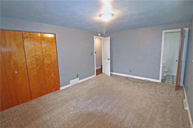 418 Newport Dr, Hempfield Twp Wml, PA 15601 - unfurnished bedroom with carpet, baseboards, a closet, and ensuite bath