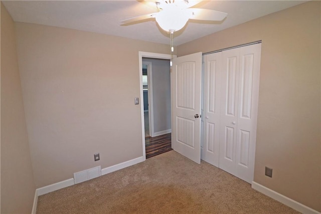 418 Newport Dr, Hempfield Twp Wml, PA 15601 - unfurnished bedroom featuring carpet flooring, a closet, baseboards, and ceiling fan
