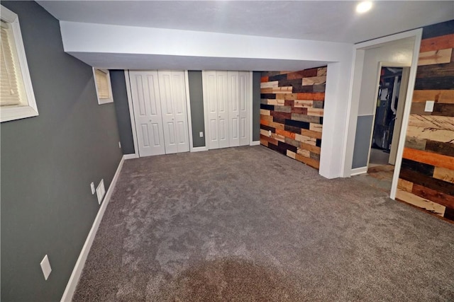 418 Newport Dr, Hempfield Twp Wml, PA 15601 - unfurnished bedroom featuring carpet floors, baseboards, and multiple closets