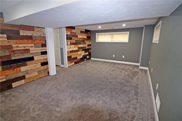 418 Newport Dr, Hempfield Twp Wml, PA 15601 - basement featuring wood walls, carpet, baseboards, and recessed lighting