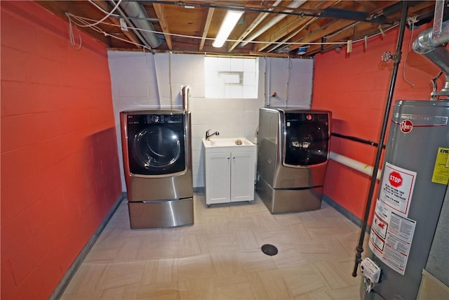 418 Newport Dr, Hempfield Twp Wml, PA 15601 - laundry room with gas water heater, washer and clothes dryer, light flooring, and concrete block wall