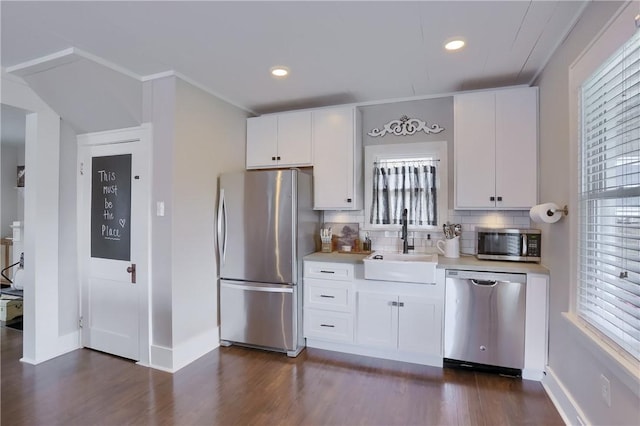 27 Laurel Ave, City Of Washington, PA 15301 - kitchen with stainless steel appliances, a sink, light countertops, baseboards, and dark wood-type flooring