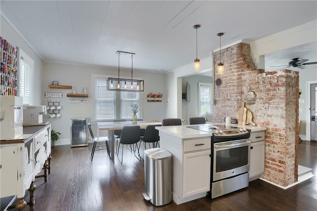 27 Laurel Ave, City Of Washington, PA 15301 - kitchen with electric range, healthy amount of natural light, dark wood-type flooring, and crown molding