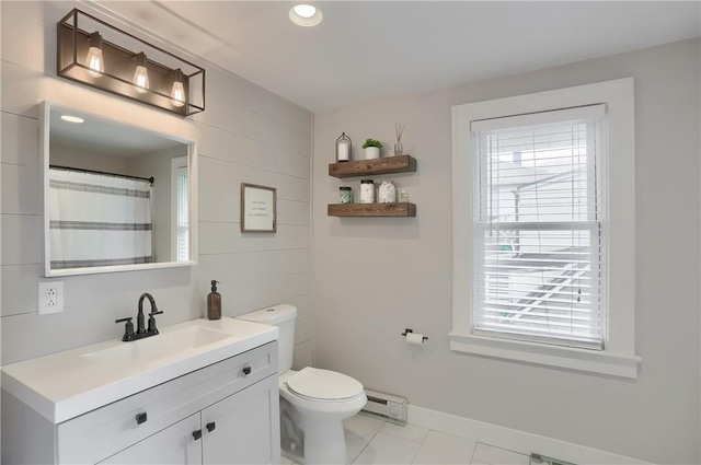27 Laurel Ave, City Of Washington, PA 15301 - full bath featuring vanity, a baseboard heating unit, toilet, baseboards, and tile patterned floors