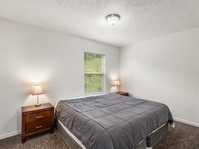8045 Maureen Dr, Cranberry Twp, PA 16066 - bedroom with dark carpet, baseboards, and a textured ceiling