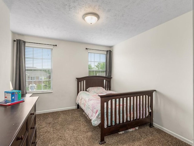 8045 Maureen Dr, Cranberry Twp, PA 16066 - bedroom featuring carpet flooring, baseboards, and a textured ceiling
