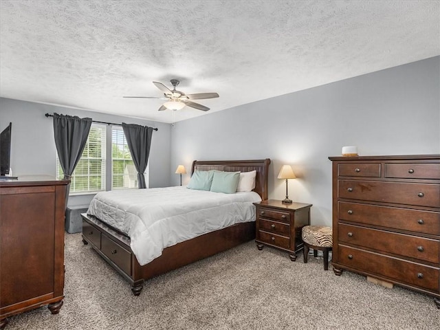 8045 Maureen Dr, Cranberry Twp, PA 16066 - bedroom with light carpet, a textured ceiling, and a ceiling fan