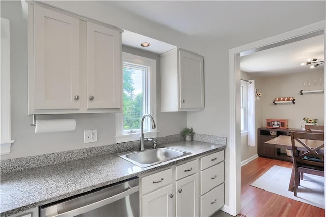 2114 Swallow Hill Rd, Scott Twp Sal, PA 15220 - kitchen with stainless steel dishwasher, a sink, and white cabinets