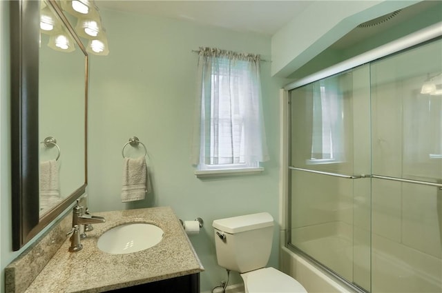 2114 Swallow Hill Rd, Scott Twp Sal, PA 15220 - full bath with vanity, toilet, shower / bath combination with glass door, and plenty of natural light