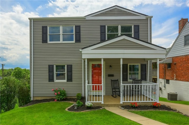 2114 Swallow Hill Rd, Scott Twp Sal, PA 15220 - view of front facade with covered porch, a front yard, and central AC unit