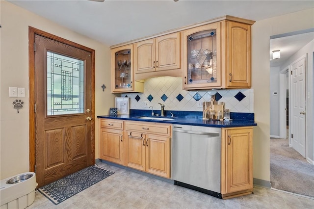 418 Lawnwood Ave, Brentwood, PA 15227 - kitchen featuring stainless steel dishwasher, a sink, dark countertops, tasteful backsplash, and glass insert cabinets
