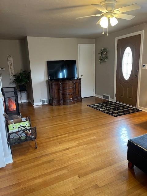 102 Rose Ave, Ross Twp, PA 15229 - entryway with light wood-style floors, a ceiling fan, and baseboards