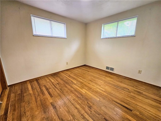 116 Bellwood Rd, West Mifflin, PA 15122 - spare room with wood finished floors and baseboards