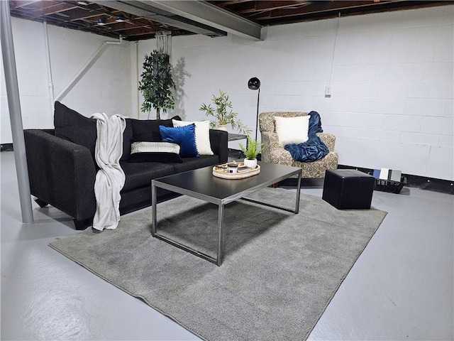 116 Bellwood Rd, West Mifflin, PA 15122 - living room featuring concrete floors and concrete block wall