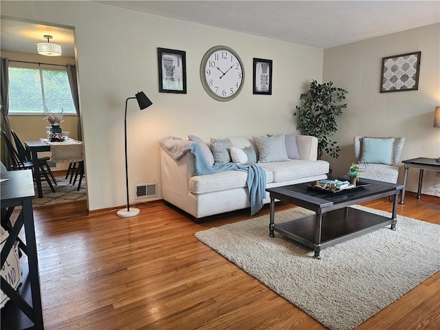 116 Bellwood Rd, West Mifflin, PA 15122 - living area featuring wood finished floors and baseboards